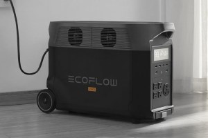 Ecoflow's Delta Pro power station plugged into an outlet.