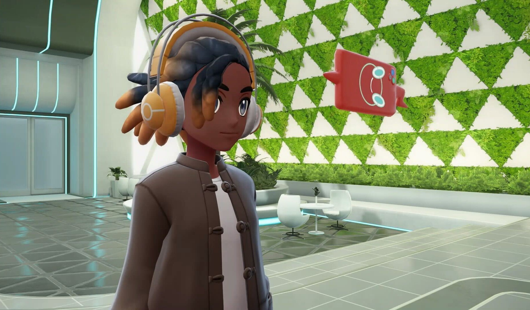 A Pokémon Legends: Z-A screenshot depicting a trainer standing in an office lobby and looking at his Rotom Phone.
