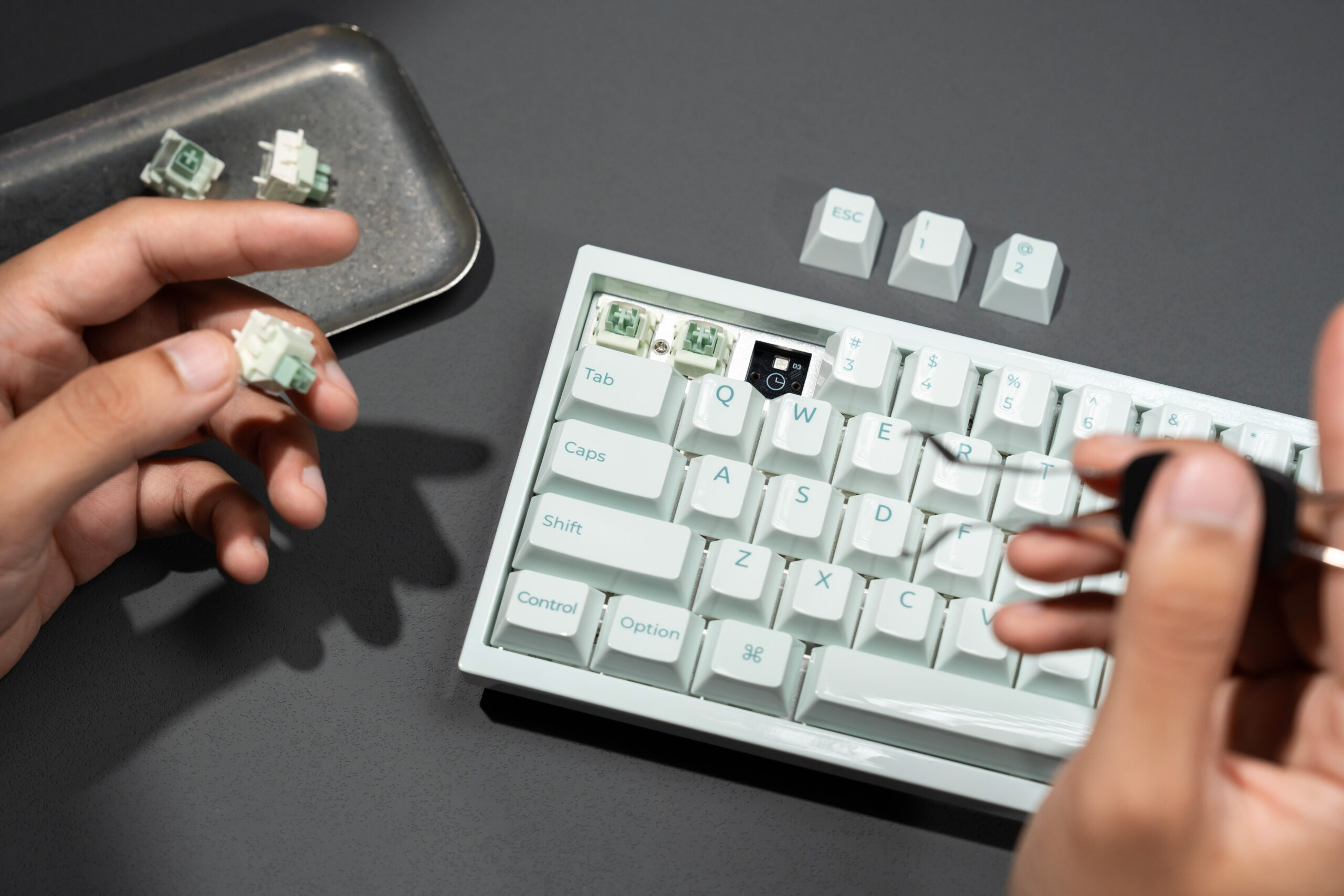 The Keychron Q16 HE 8K keyboard with exposed mechanical switches.