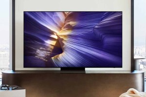 Samsung's S90F 4K TV on top of a stand.