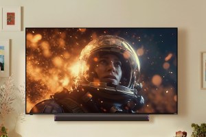 Vizio's SL512X-08 beneath a TV.