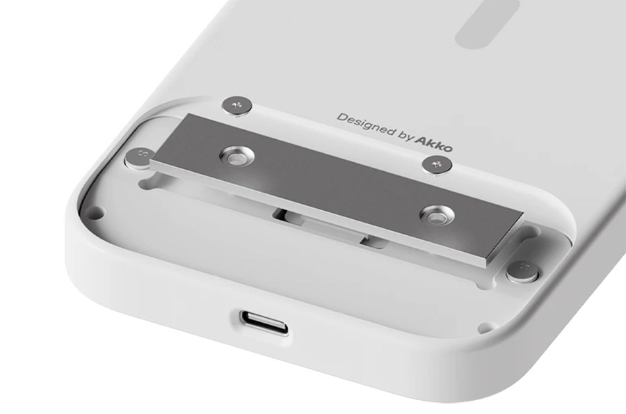 The back of the Akko MetaKey iPhone case showing a removable counterweight.
