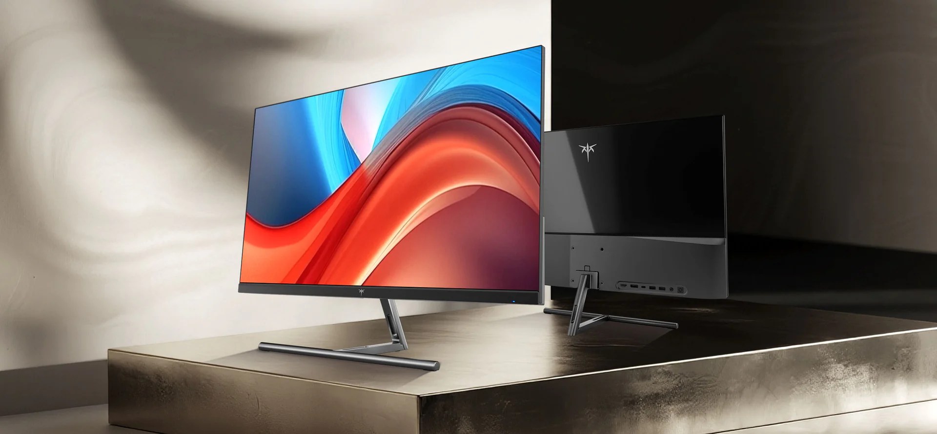 The front and rear view of the KTC H27P3 5K monitor on a fancy looking table.