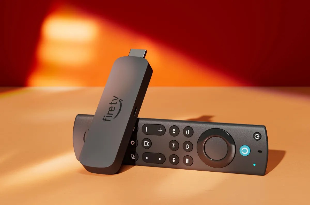 The Amazon Fire TV Stick 4K Max resting on desk.