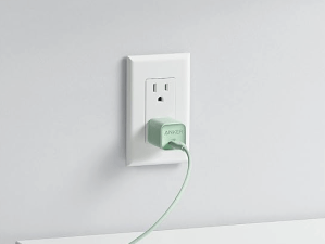 The Anker Nano 3 Charger plugged into a wall outlet.