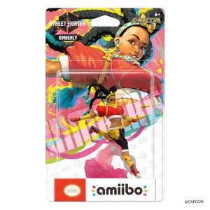 A Kimberly Amiibo in a box on a plain white background.