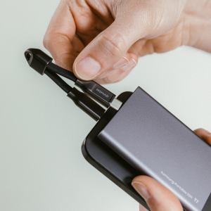 The Nomad ChargeKey connected to a portable hard drive and smartphone.