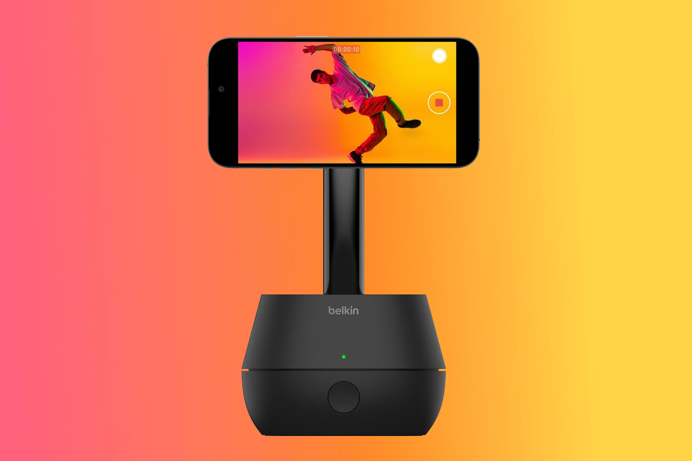 The Belkin Auto-Tracking Stand Pro with an iPhone attached and a person dancing on screen.