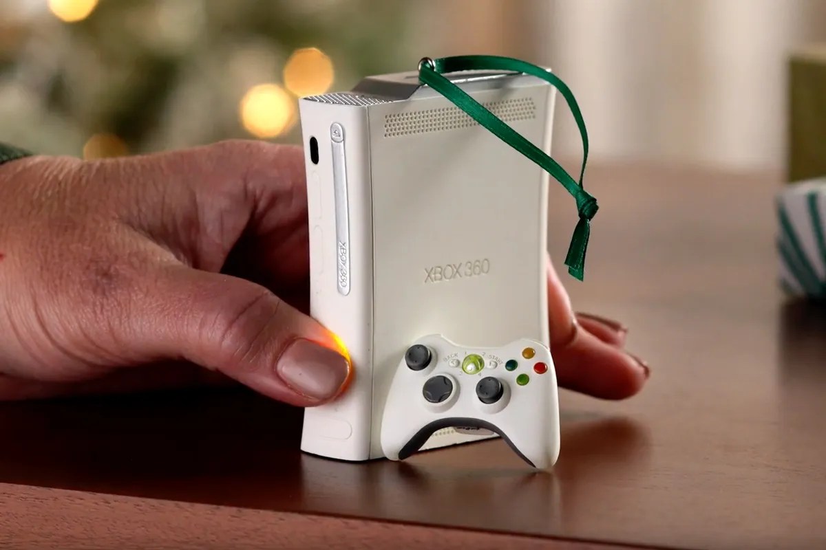 An image of the Microsoft Xbox 360 replica ornament, which is hand-size.