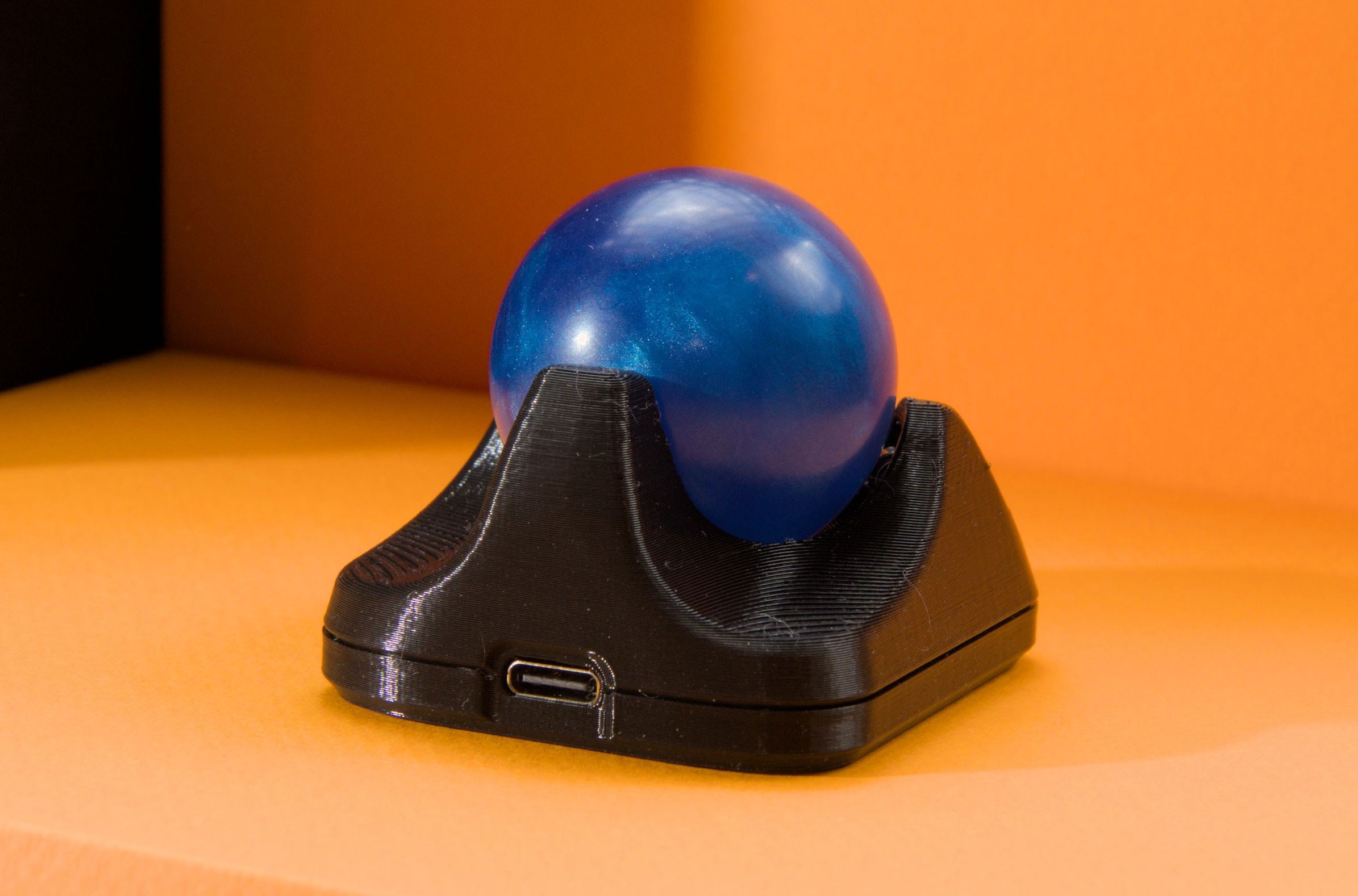 The Ploopy Nano 2 trackball showing its USB-C port.