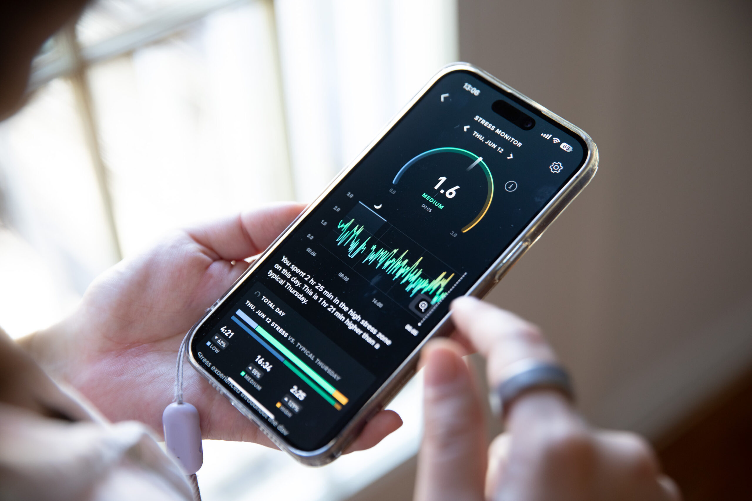 Person looking at Whoop health tracking data on a phone