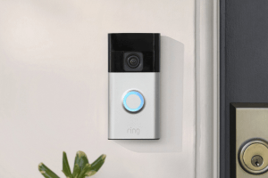 The Ring Battery Doorbell set up next to a door.