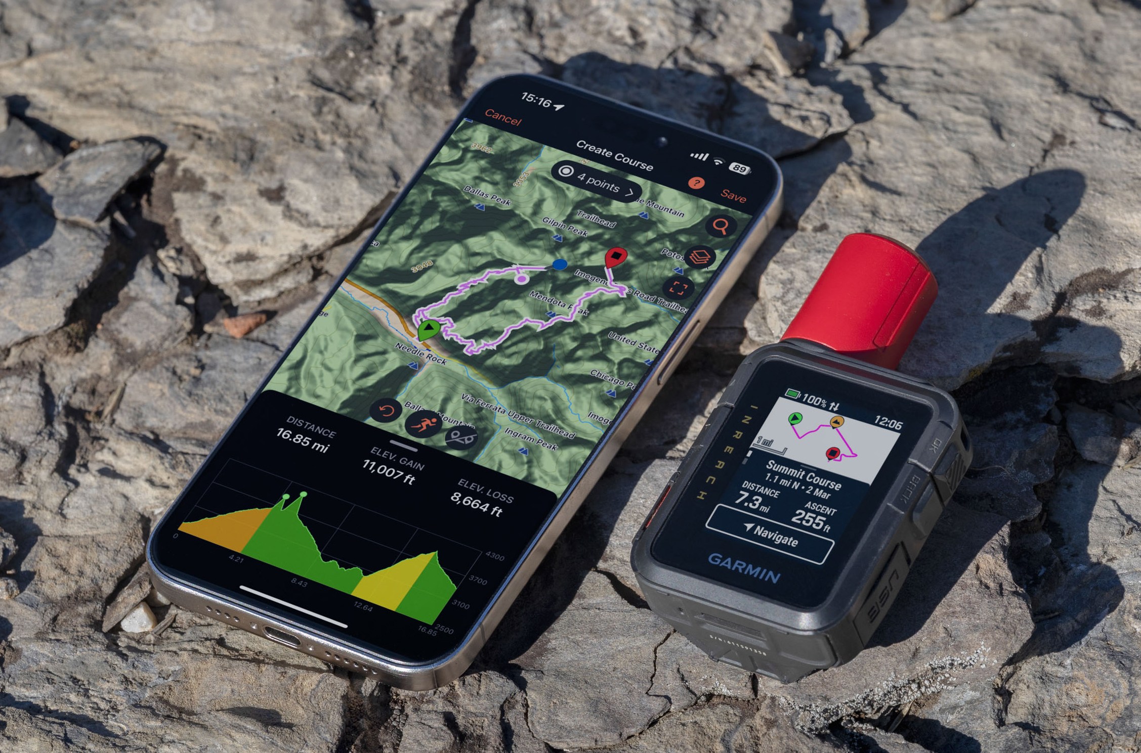 The Garmin inReach Mini 3 Plus satellite communicator next to a smartphone.