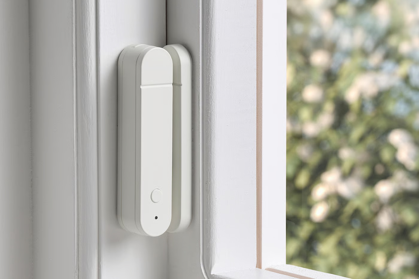 Ikea’s new Matter-compatible Myggbett sensor installed on a window.