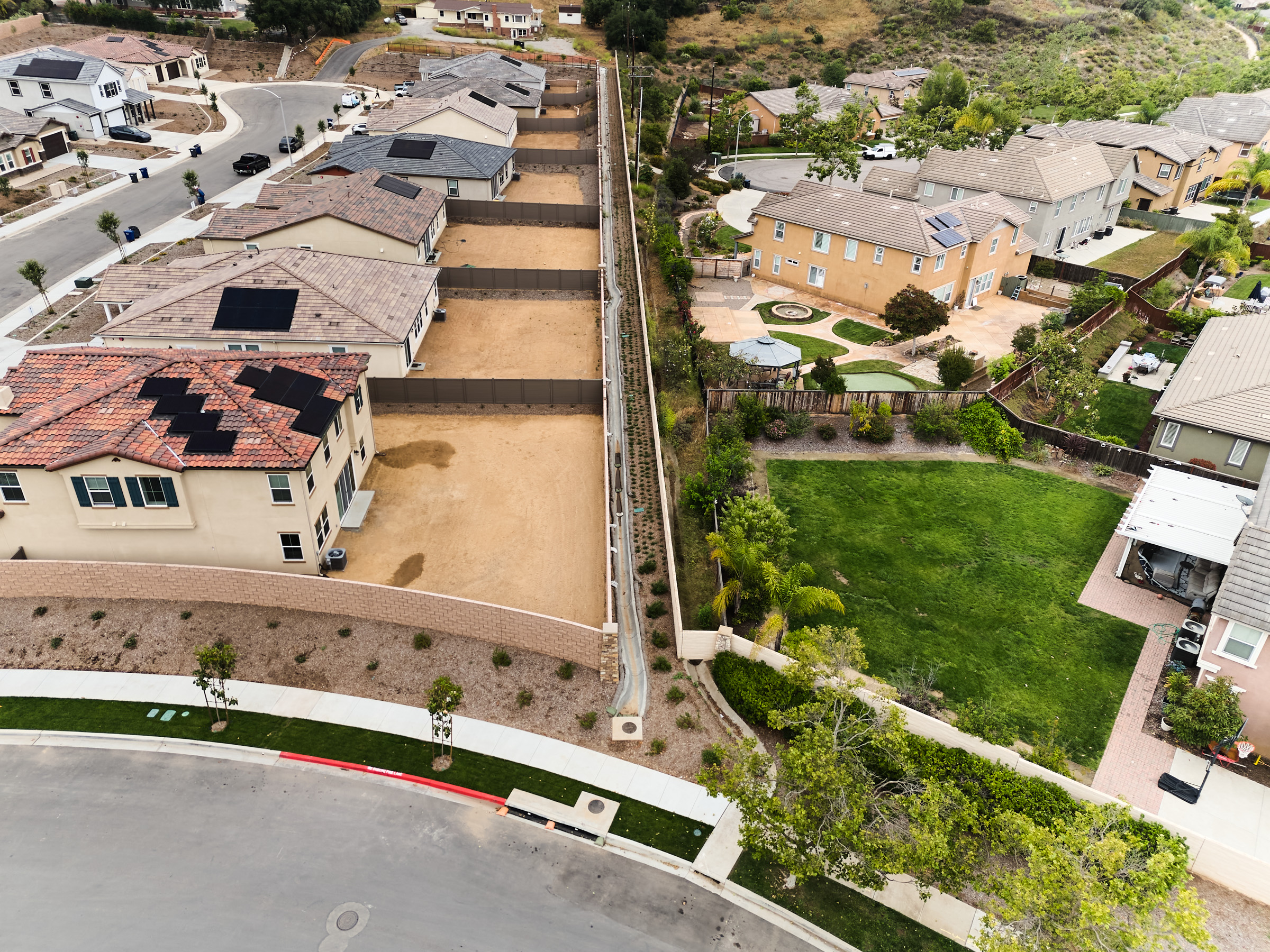 An overhead view of homes in a neighborhood.