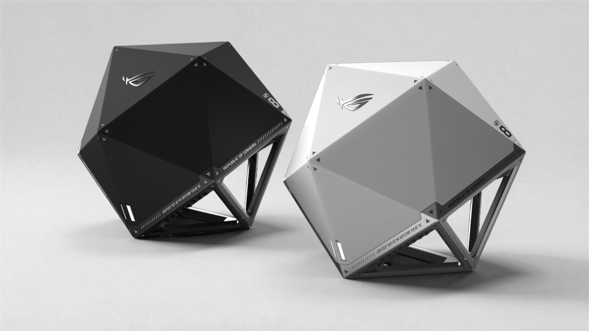 Two weird satellite looking routers sitting next to each other on a stark background. The routers resemble polyhedral dice with a hollowed-out bottom.