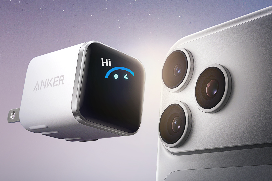 The Anker Nano Charger next to an iPhone showing a winking pair of eyes on screen saying Hi.