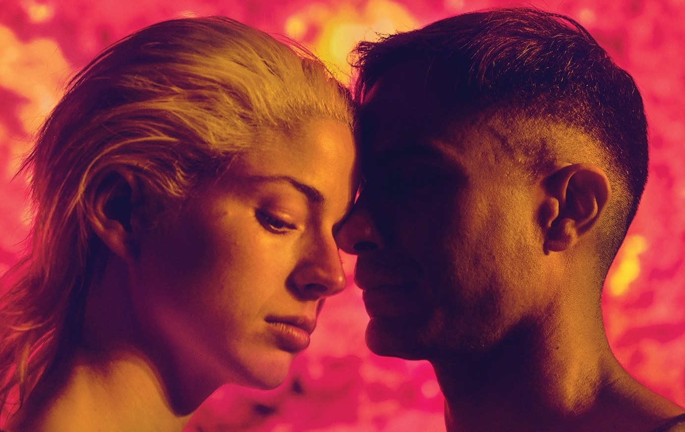 A man and a women standing face to face.