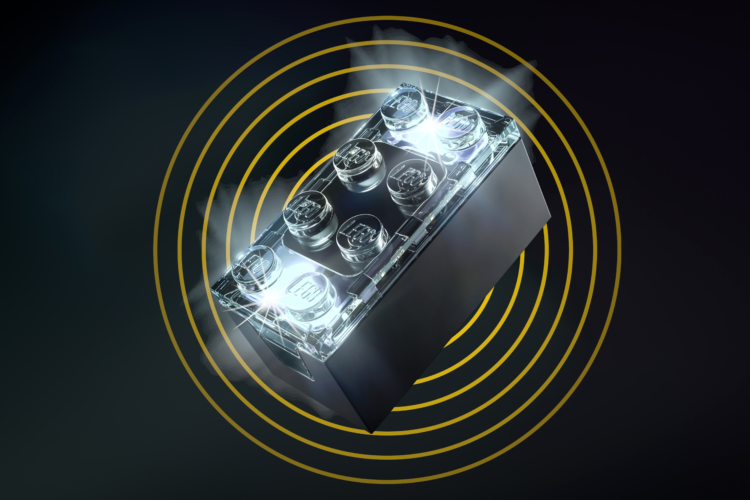 The Lego smart brick with its LED lighting glowing white.