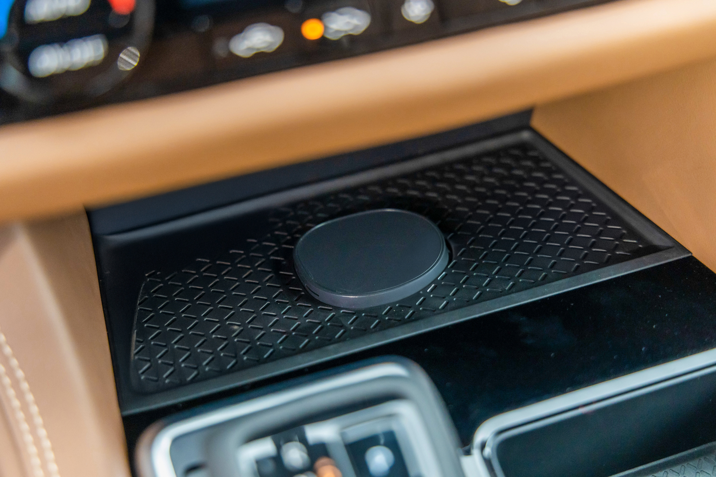 A close-up of the Qi2 wireless charger Nissan will offer in some 2026 vehicles.