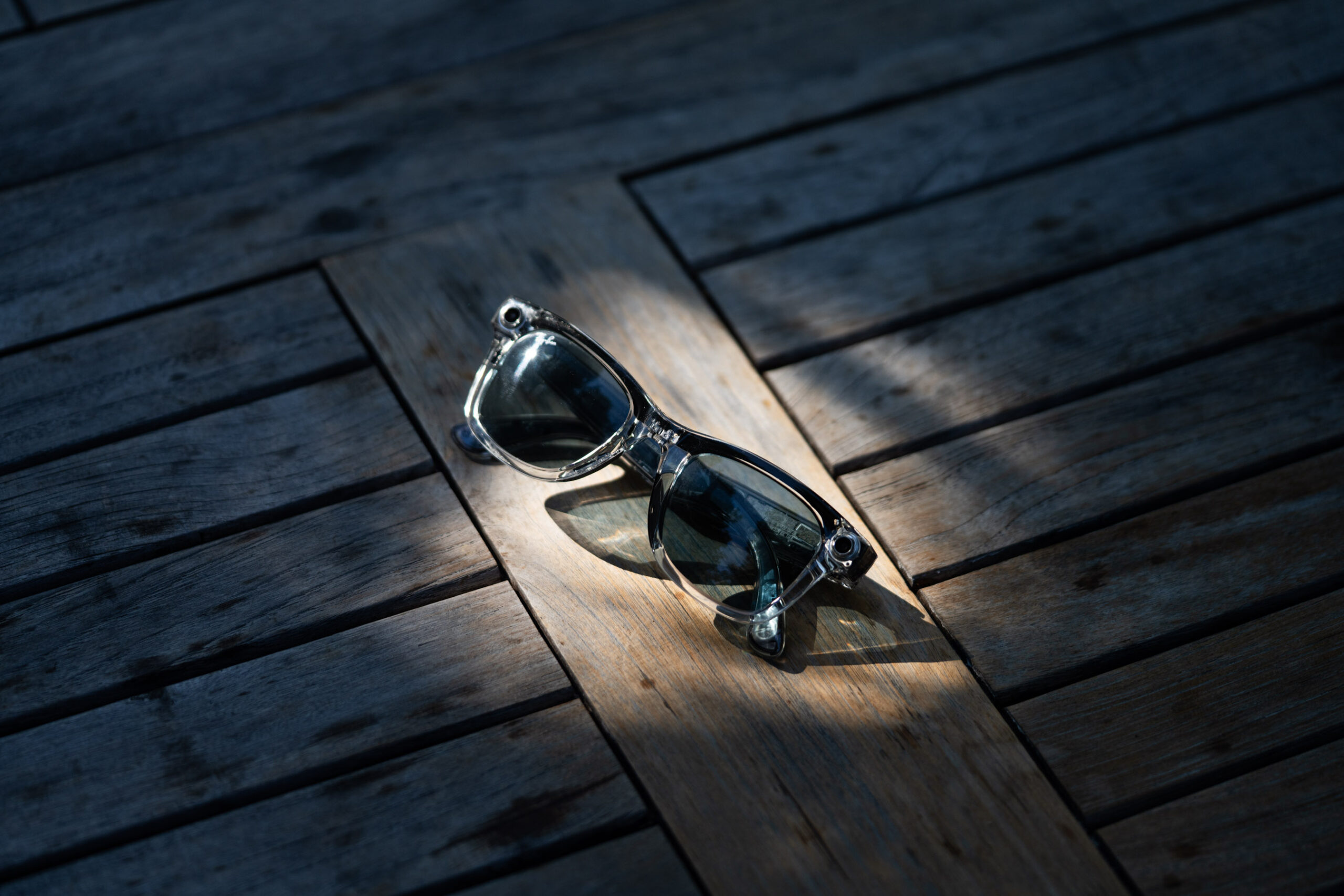 The Ray-Ban Meta smart glasses on a table.