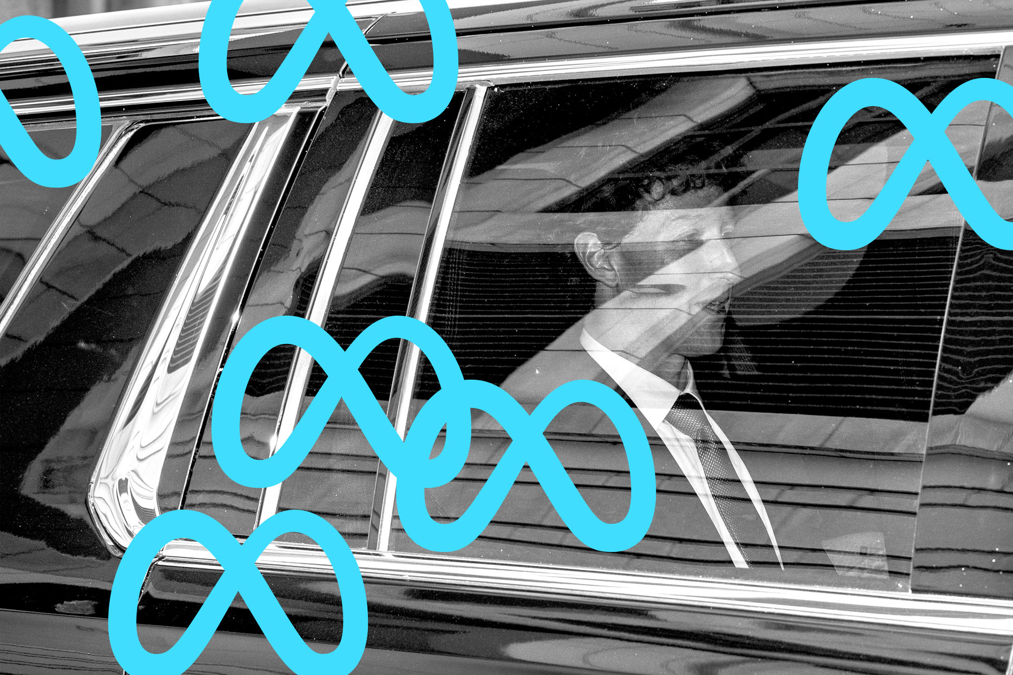 Mark Zuckerberg seen through the window of a black SUV.