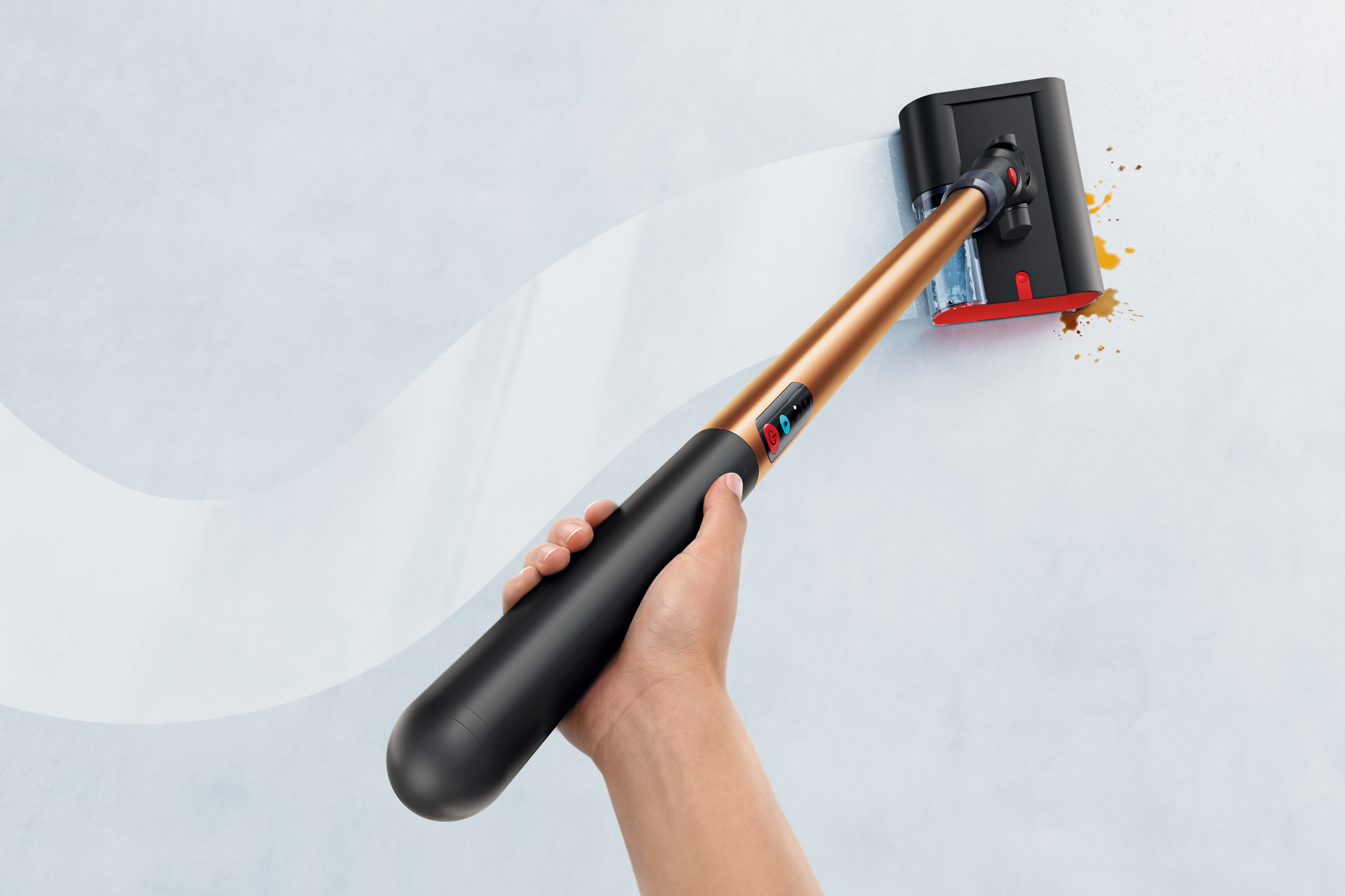 A single hand holds and steers the Dyson PencilWash floor cleaner.