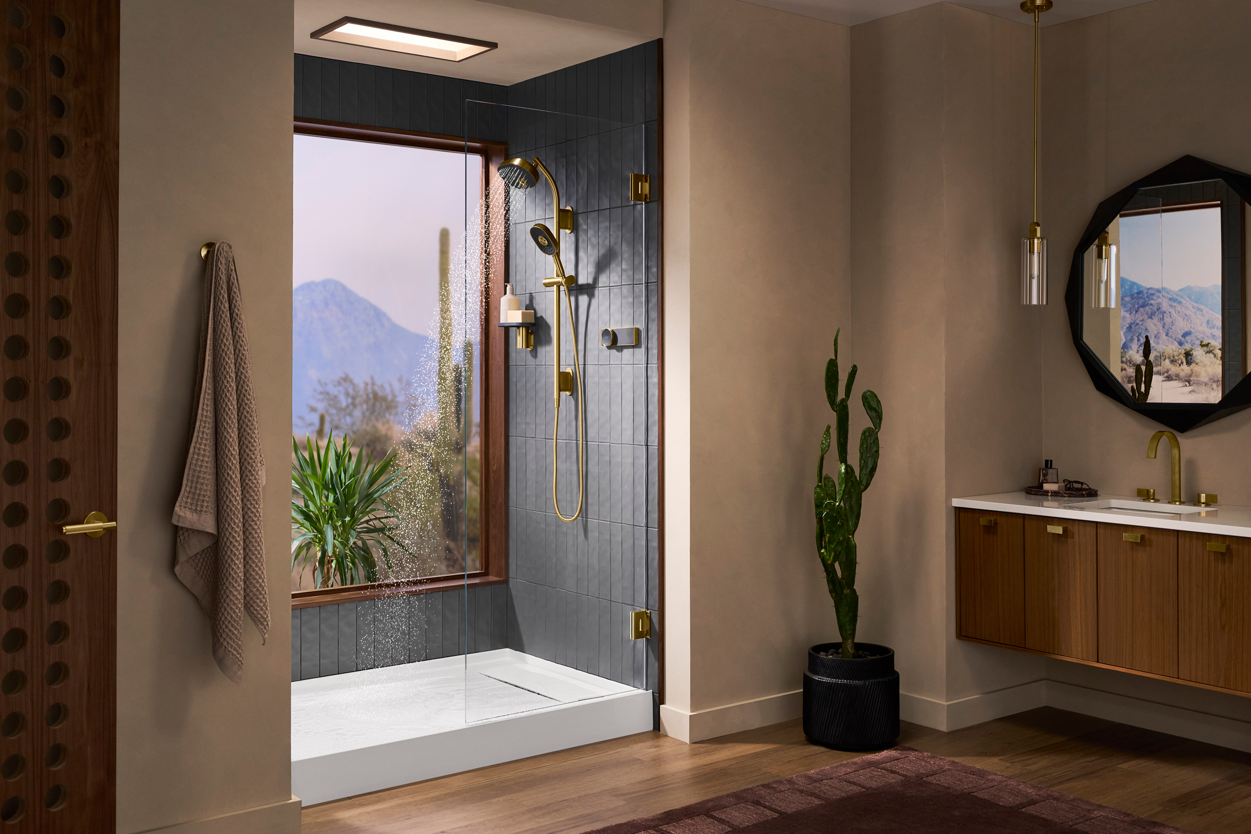 A bathroom with the Kohler Anthem EvoCycle smart shower system installed.