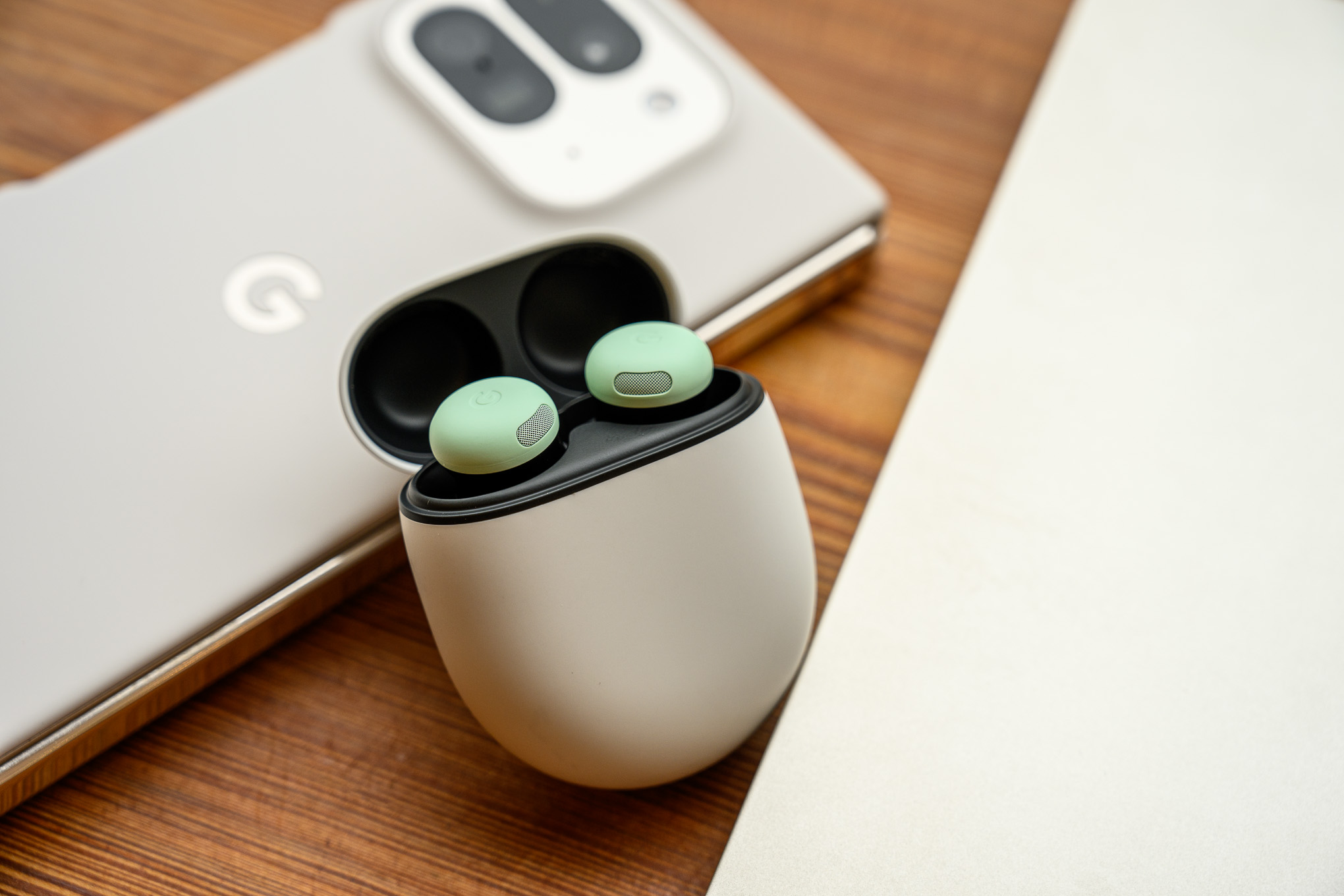 A hands-on photo of Google’s Pixel Buds Pro 2 earbuds.