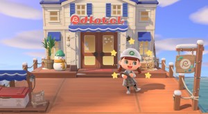 An Animal Crossing player character posing in front of a hotel on a pier.