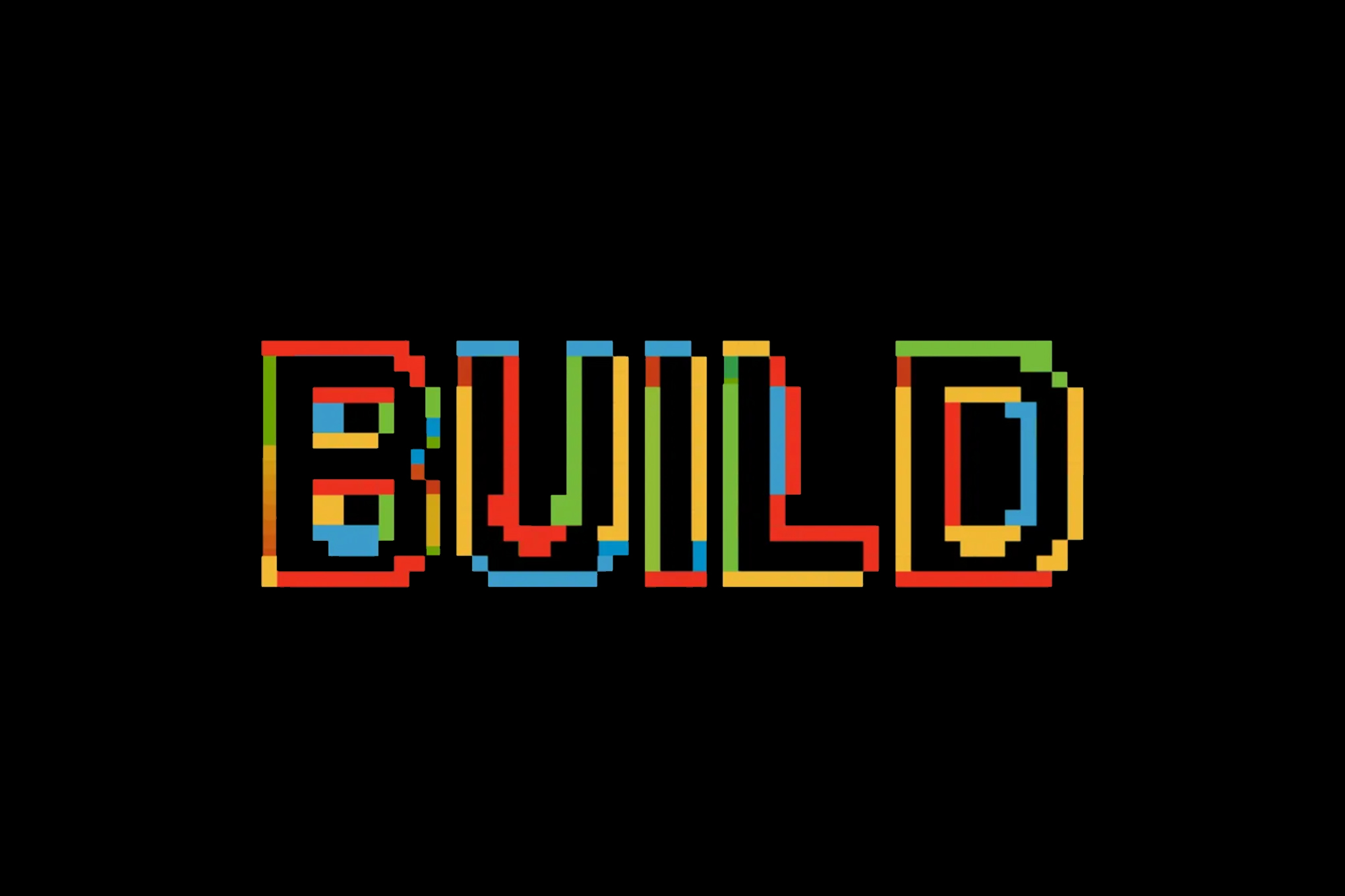 Text reads “BUILD” written in blocky, pixelated letters with Microsoft’s brand colors.