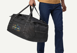 A person holding the Patagonia Black Hole Duffel