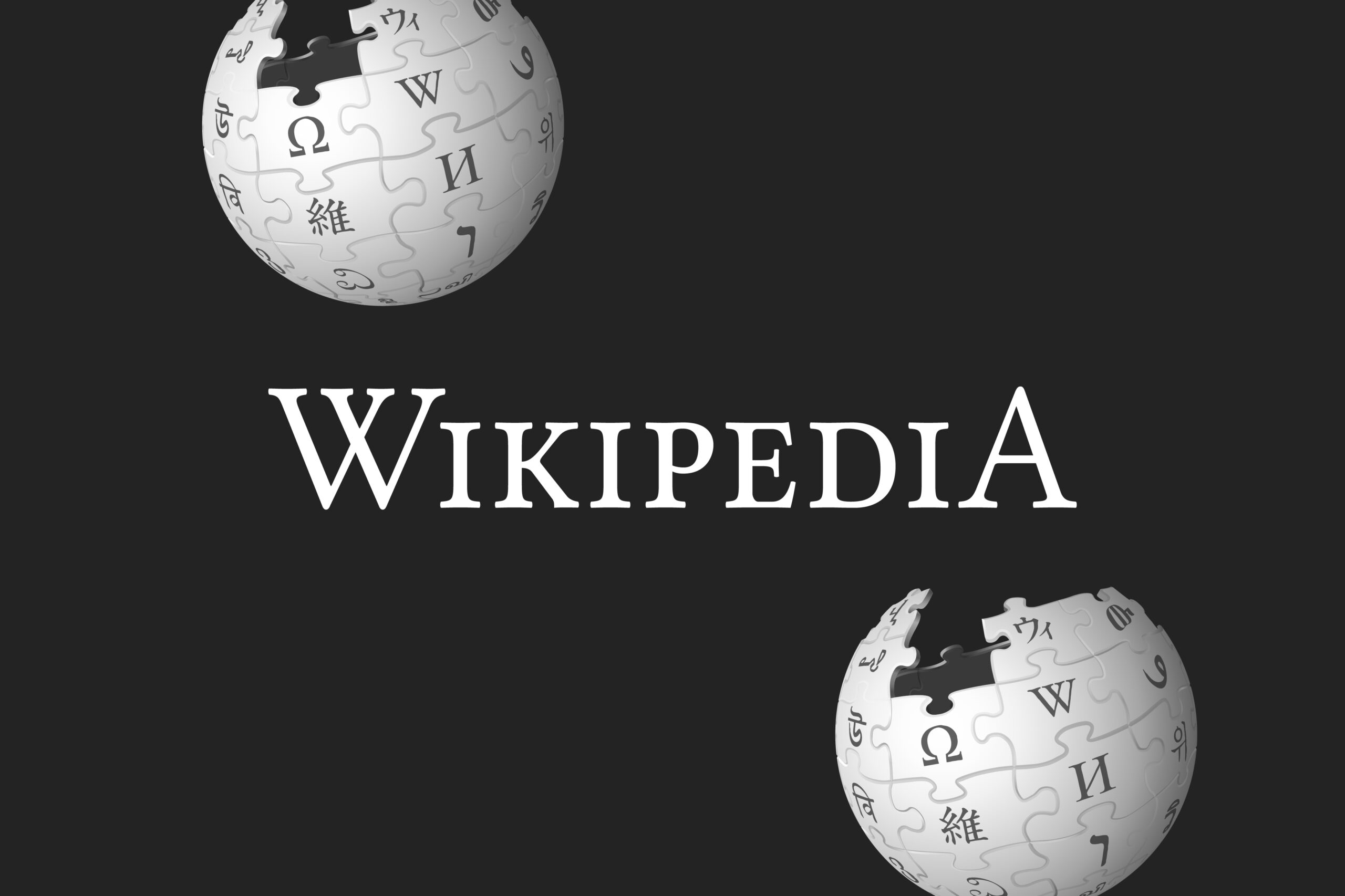 Wikipedia logo on a black background.