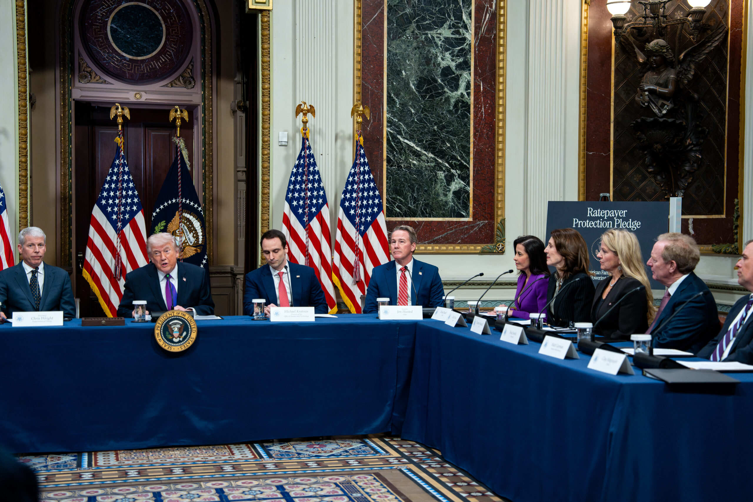 Trump, federal officials, and tech leaders sit around a table.