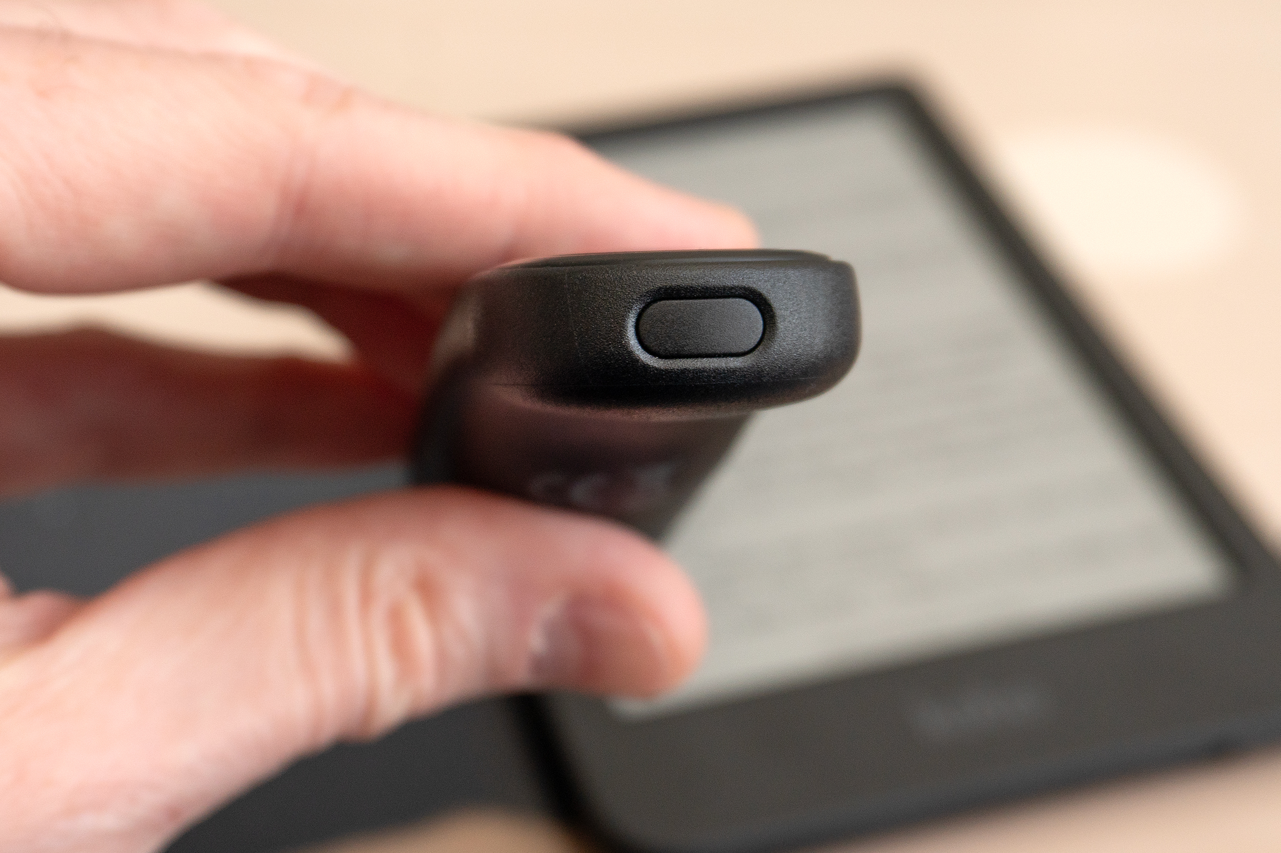 A close-up of the pairing button on the front of the Kobo Remote. A close-up of the pairing button on the front of the Kobo Remote.