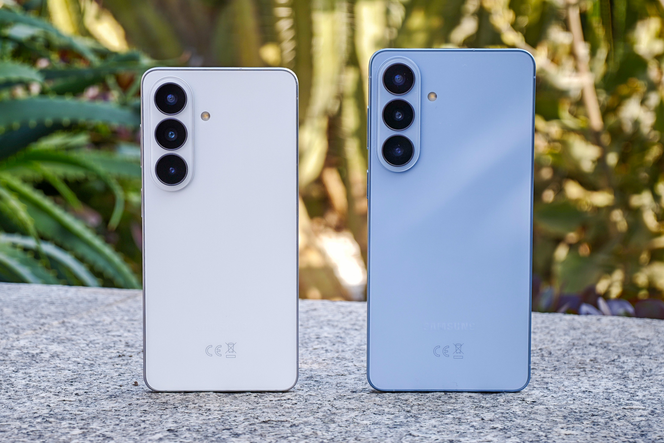 Photo of white Samsung Galaxy S26 and blue Galaxy S26 Plus side by side