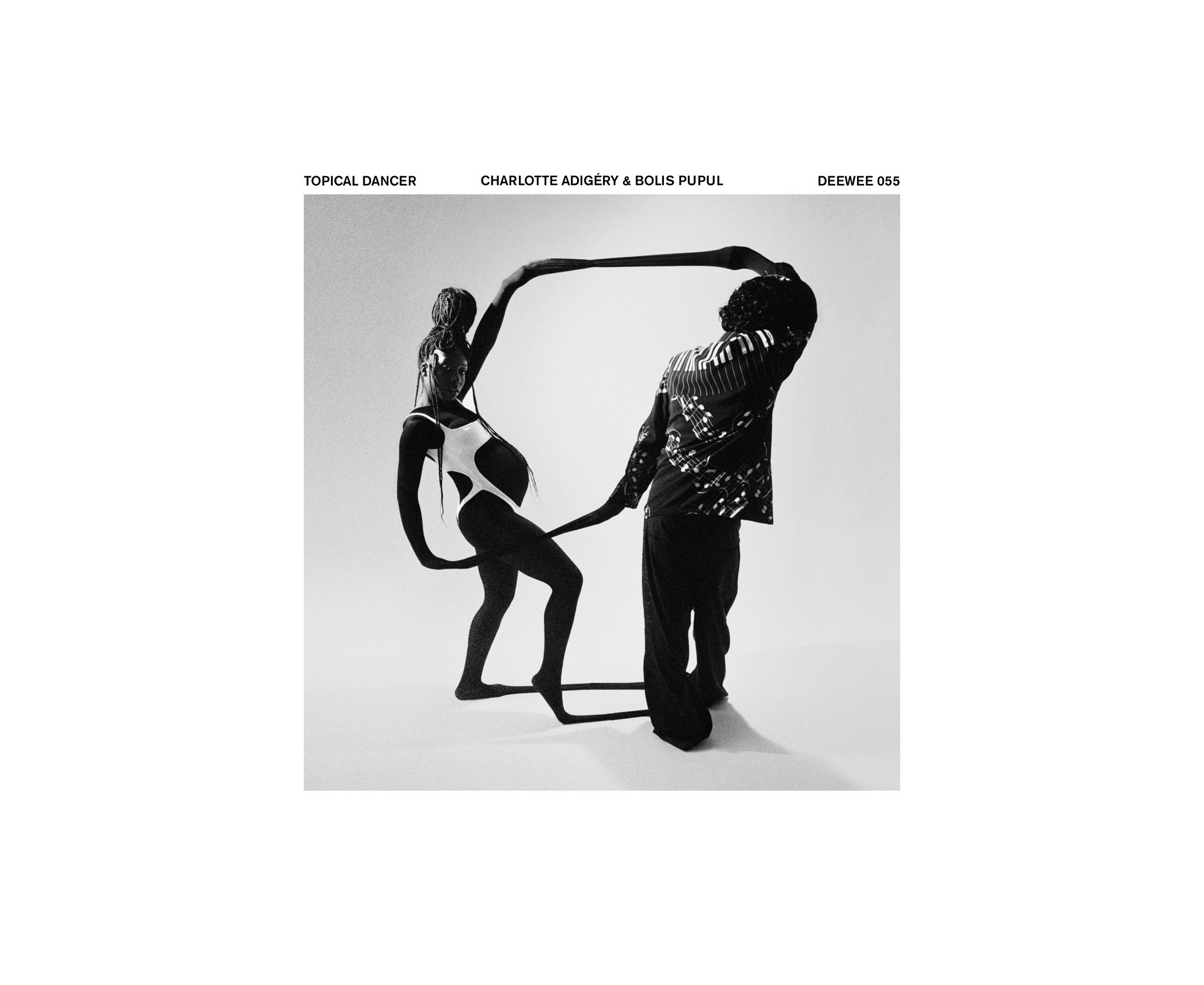 Album cover of Charlotte Adigery and Bolis Pupul’s Topical Dancer, featuring a black and white photo of them dancing while connected at the hands via long shared sleeves.