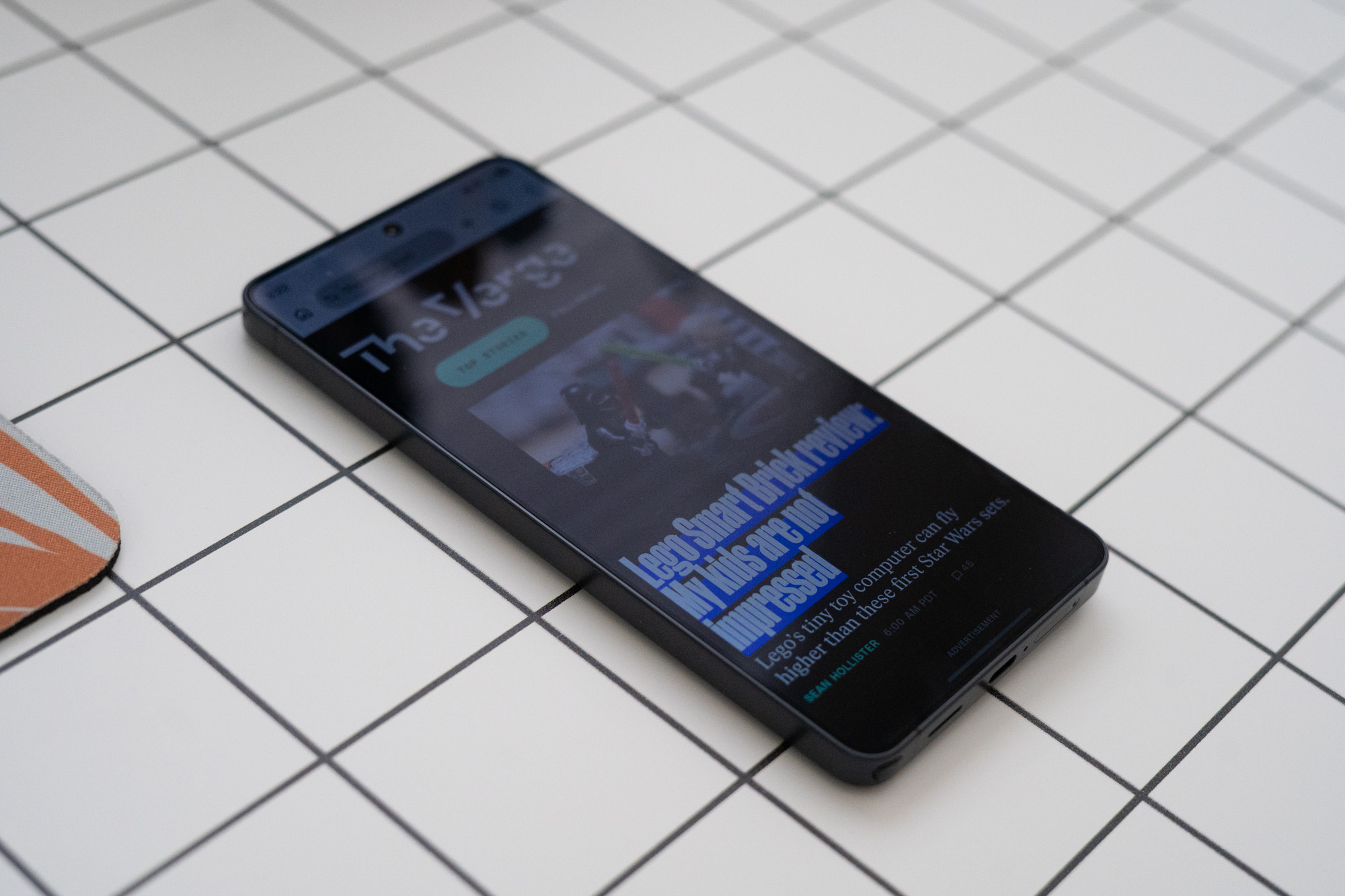 Samsung Galaxy S26 Ultra with privacy display on, screen is dim but still visible