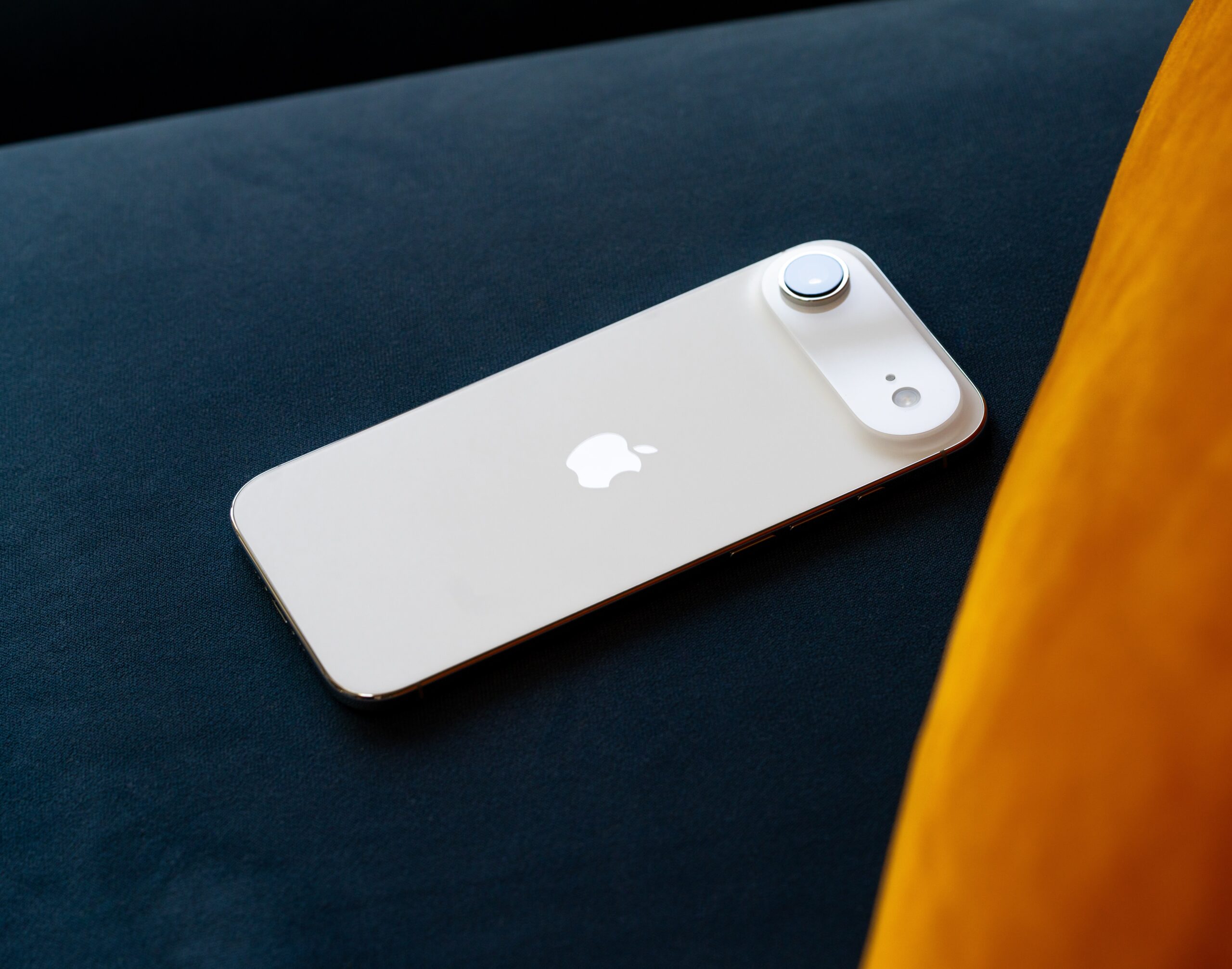 iPhone Air on a couch cushion
