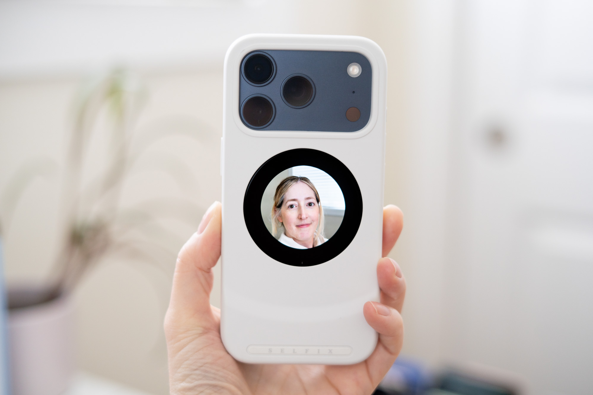 Selfix selfie phone case showing portrait mode photo on the rear screen