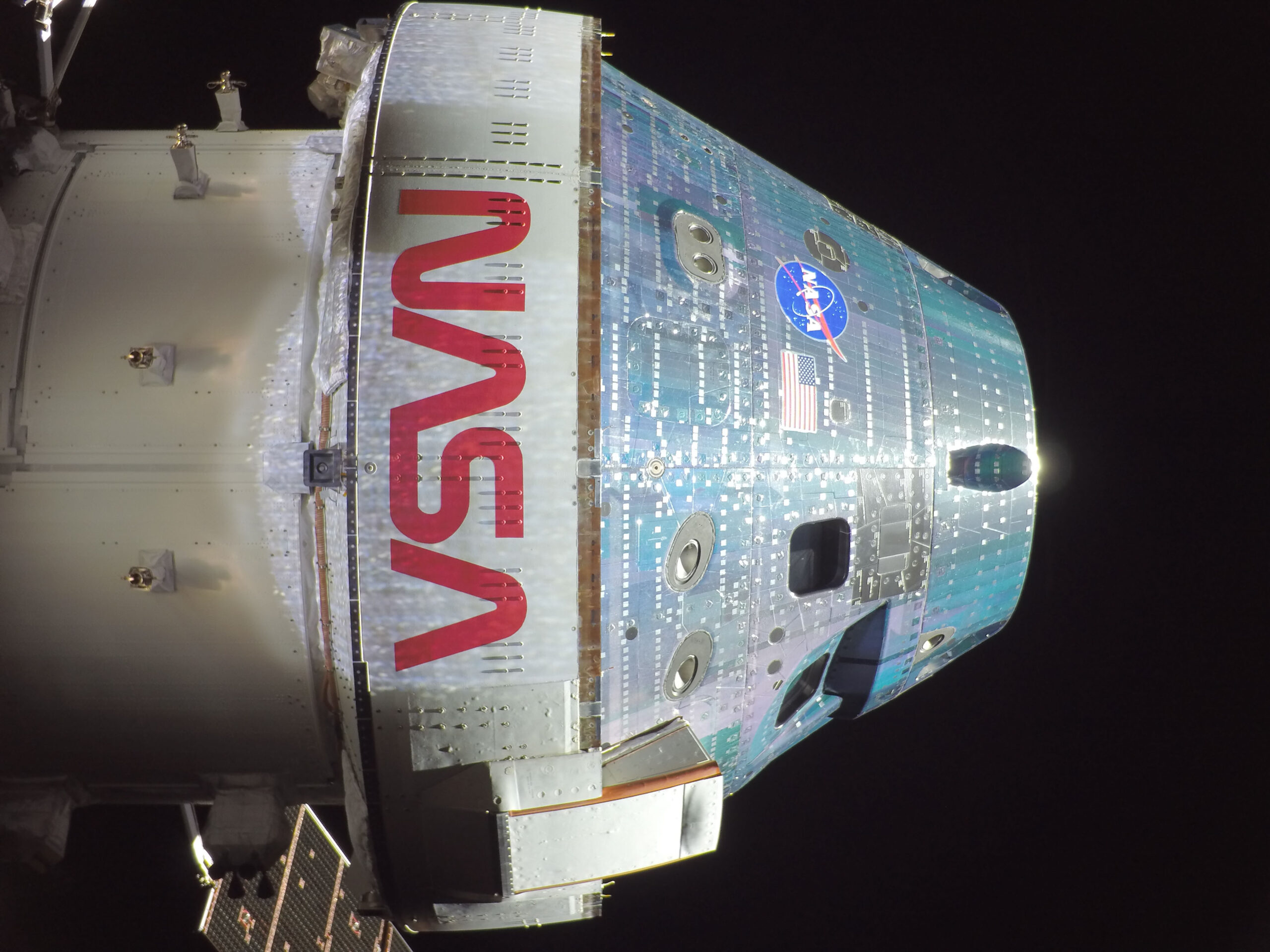 Image of the NASA logo on the outside of Orion 