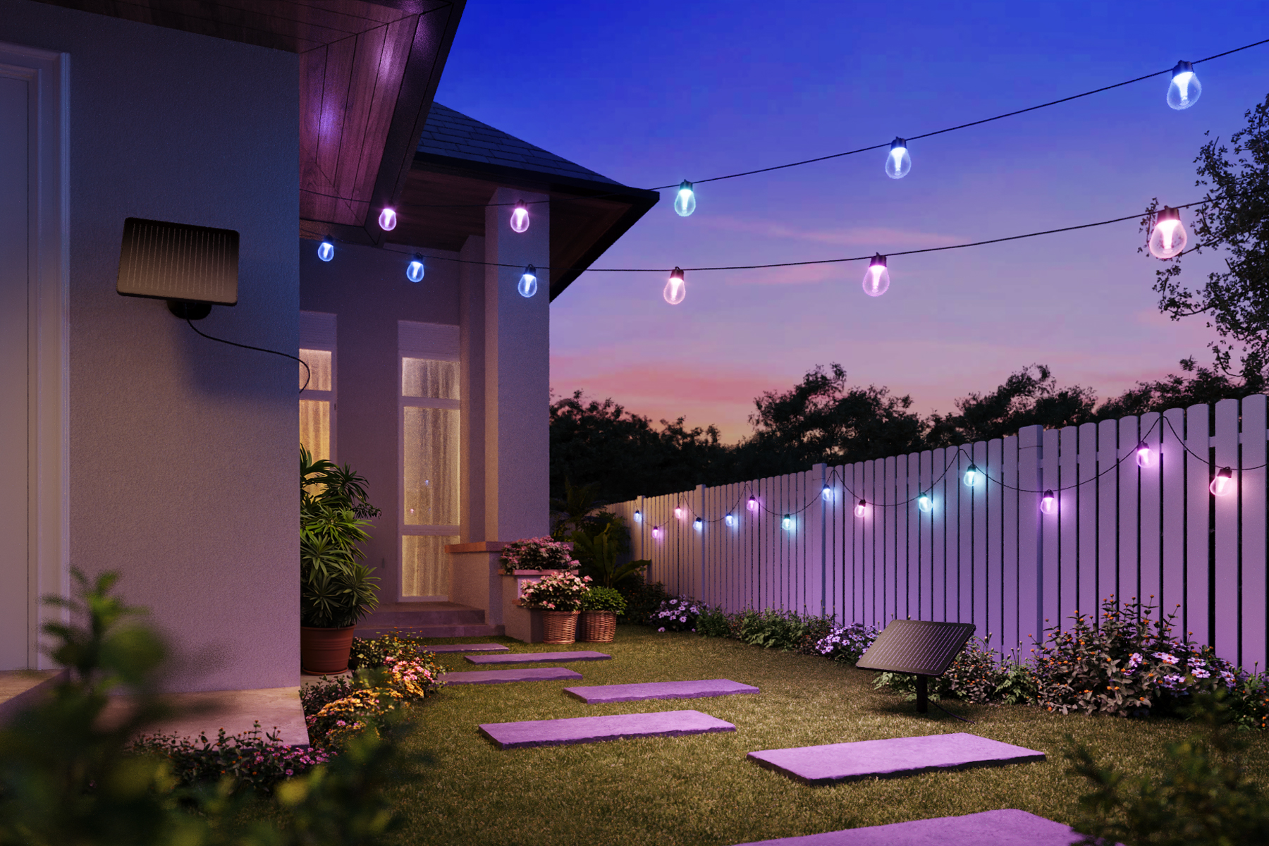 A backyard illuminated in color by Govee’s solar string lights.