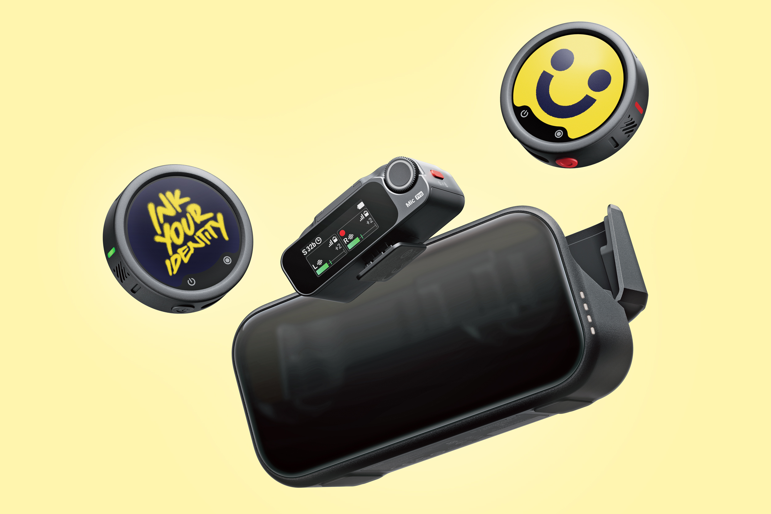 Two wireless microphones with screens floating above a charging case alongside a receiver.