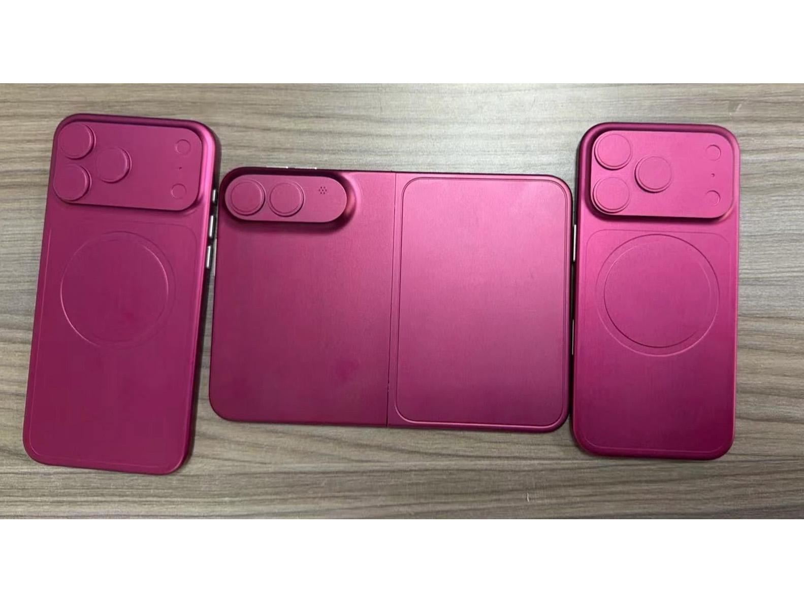 Photo of three pink dummy iPhone units for the iPhone 18 Pro, Fold, and 18 Pro Max