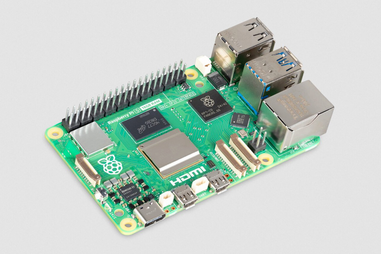 The new 16GB version of the Raspberry Pi 5 microcomputer against a neutral background.