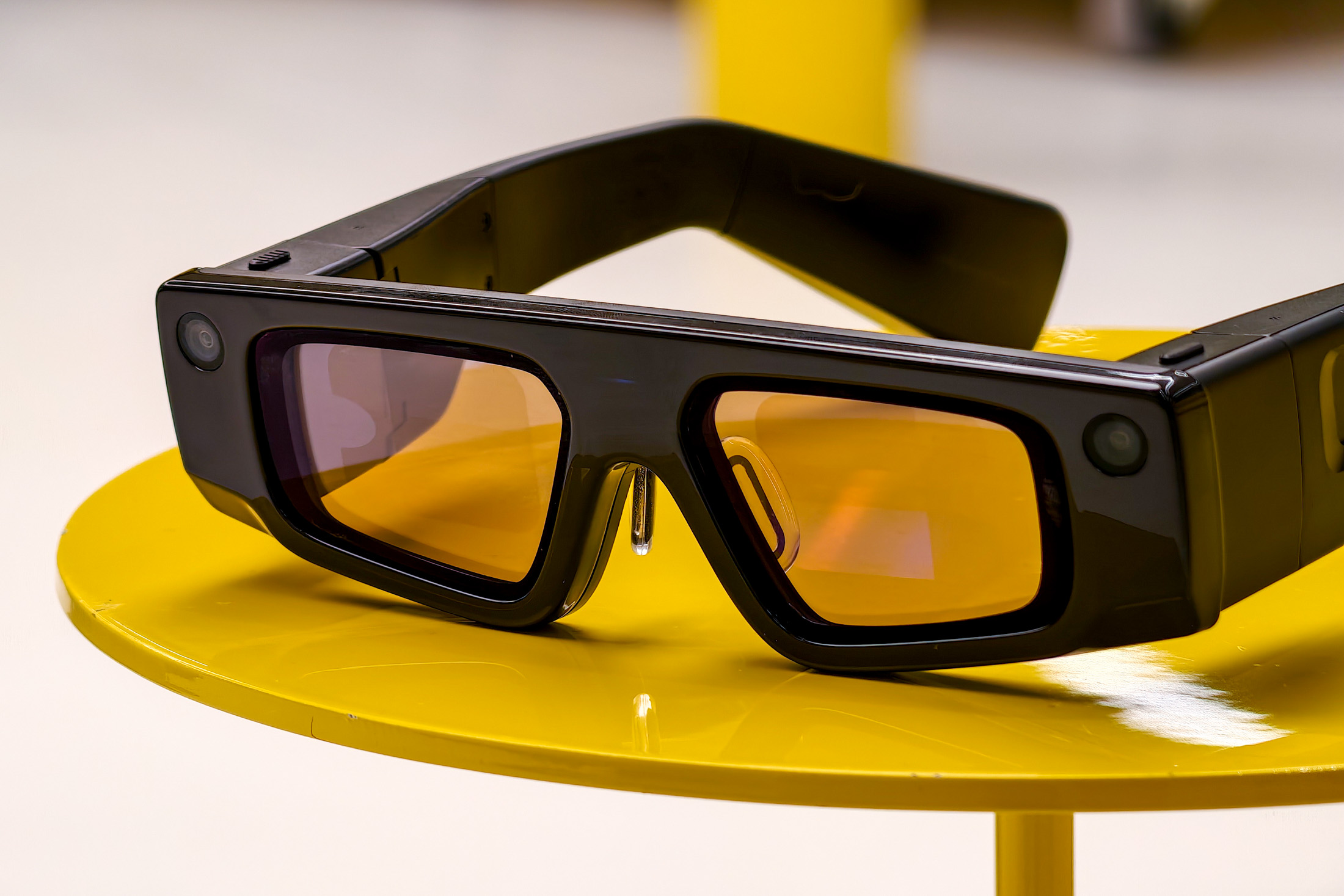 Snap Spectacles on a yellow table