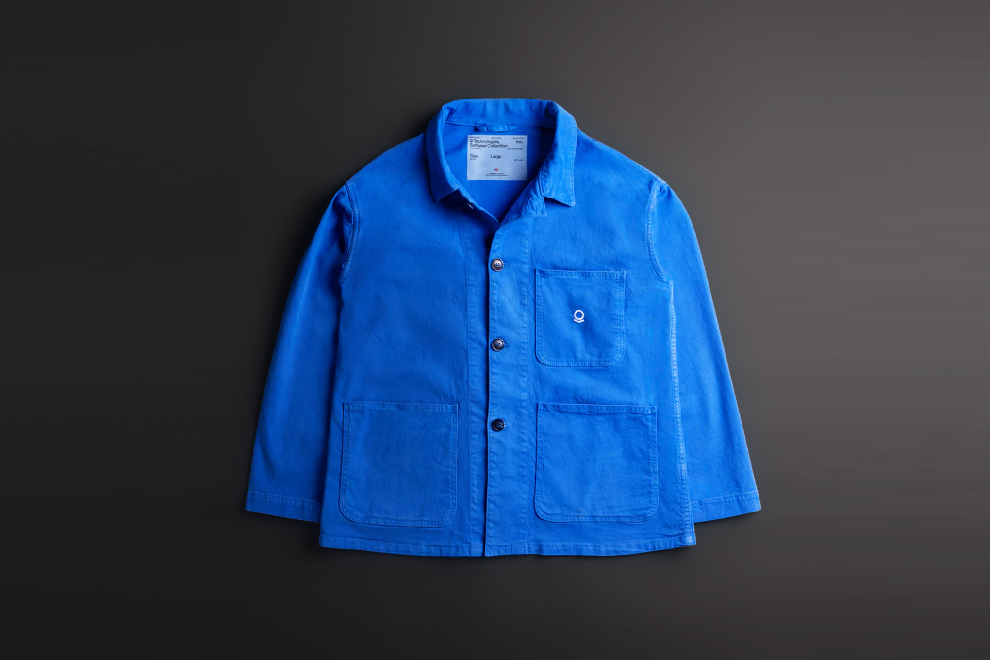 A blue chore coat with a Palantir logo on it
