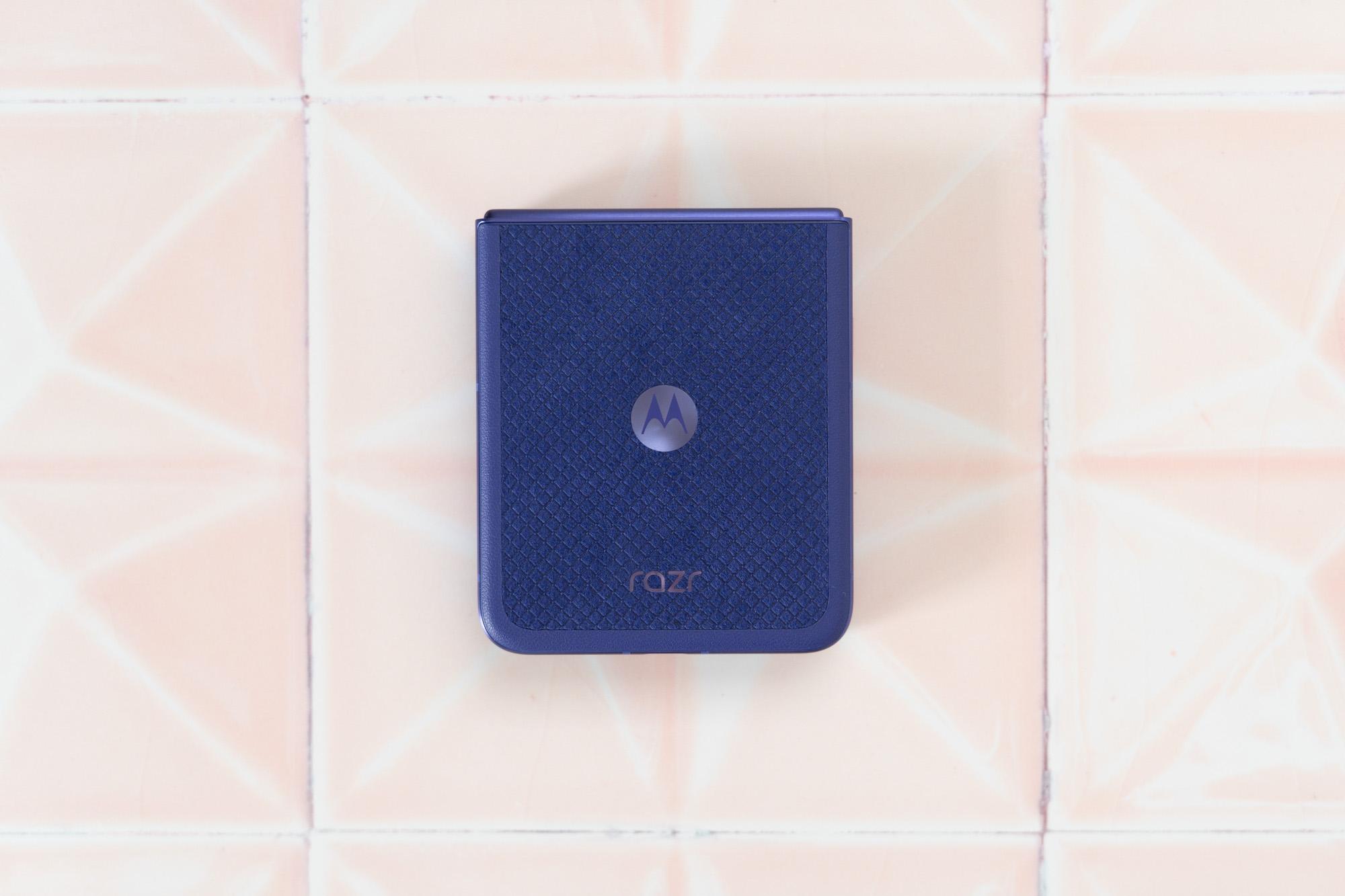 Motorola Razr Ultra 2026 on a tile surface showing blue color option