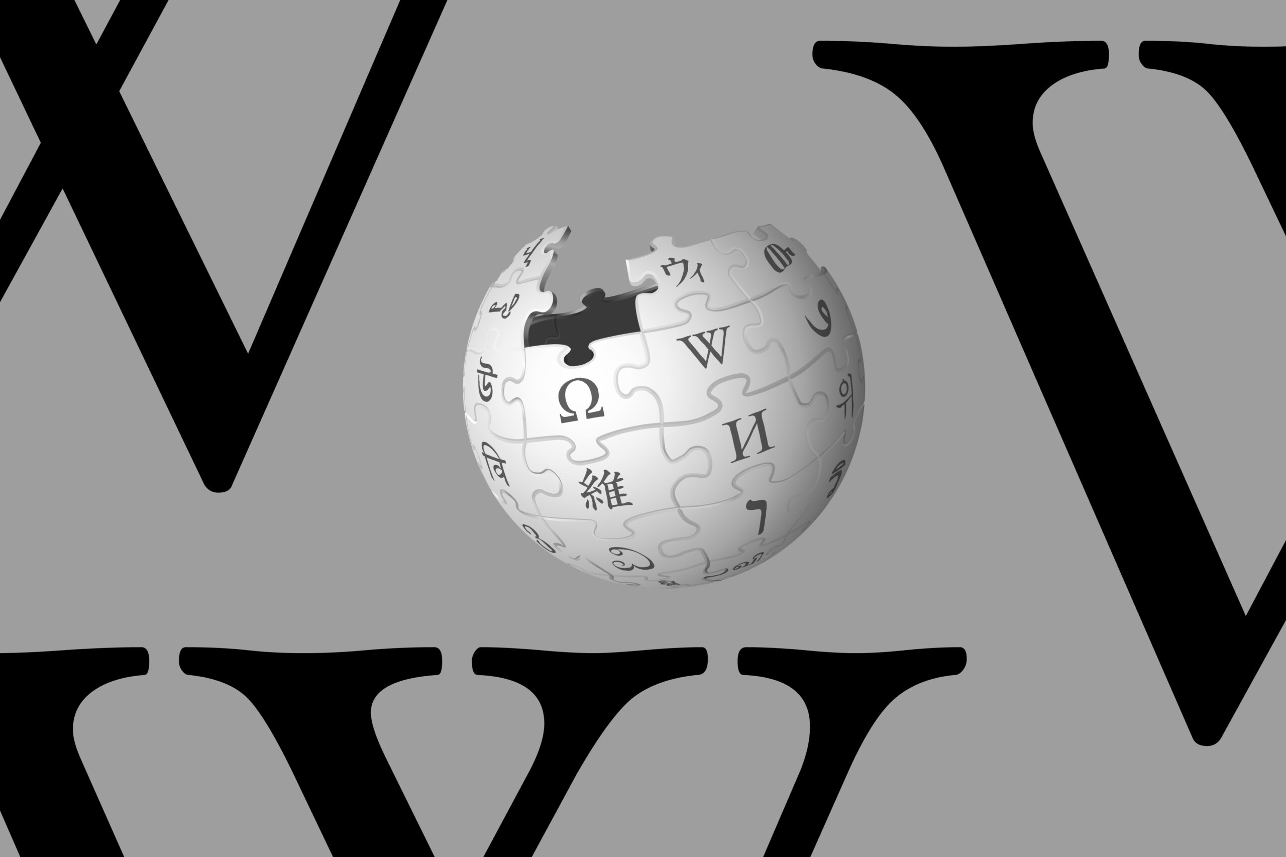 Wikipedia “W” and globe on a grey background.