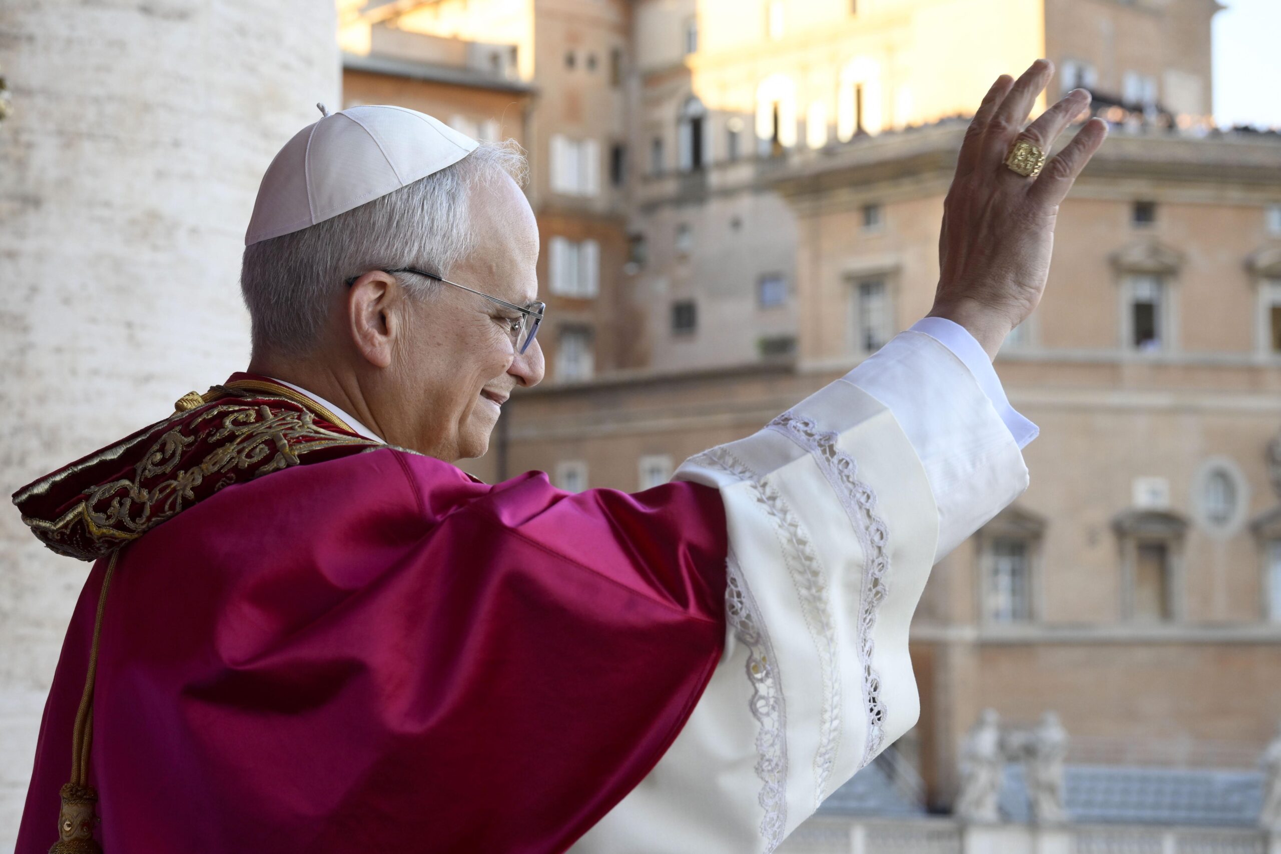 Newly elected Pope Leo XIV, Robert Prevost addresses the crowd on the main central loggia balcony overlooking St Peter's Square on May 08, 2025 in Vatican City, Vatican. 
